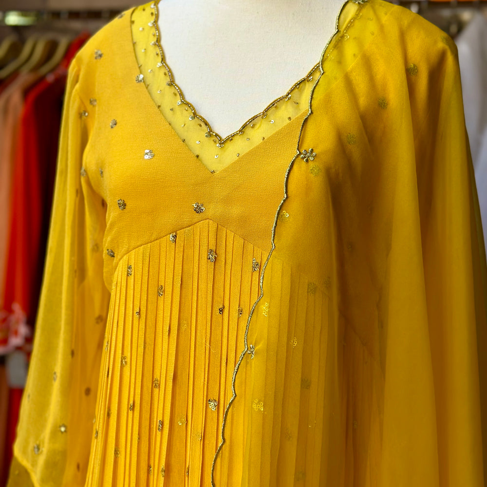 
                      
                        Sunset Yellow Embellished Kurta set
                      
                    