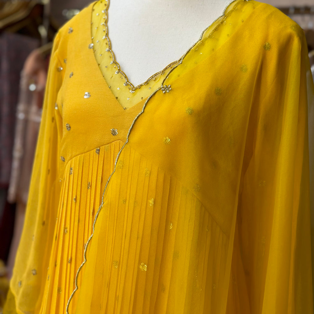 
                      
                        Sunset Yellow Embellished Kurta set
                      
                    