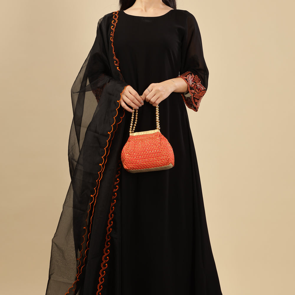 
                      
                        Black Premium embellished Burnt Orange kurta set
                      
                    