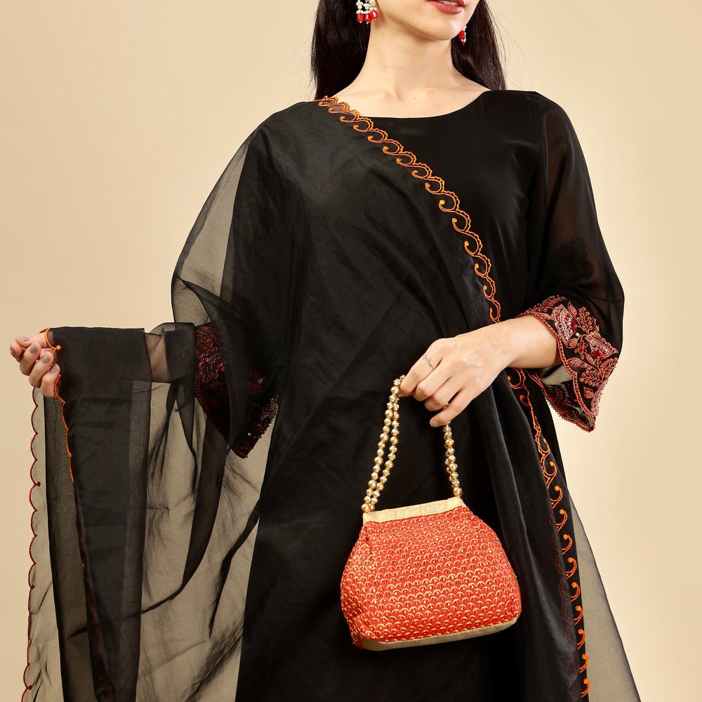 
                      
                        Black Premium embellished Burnt Orange kurta set
                      
                    