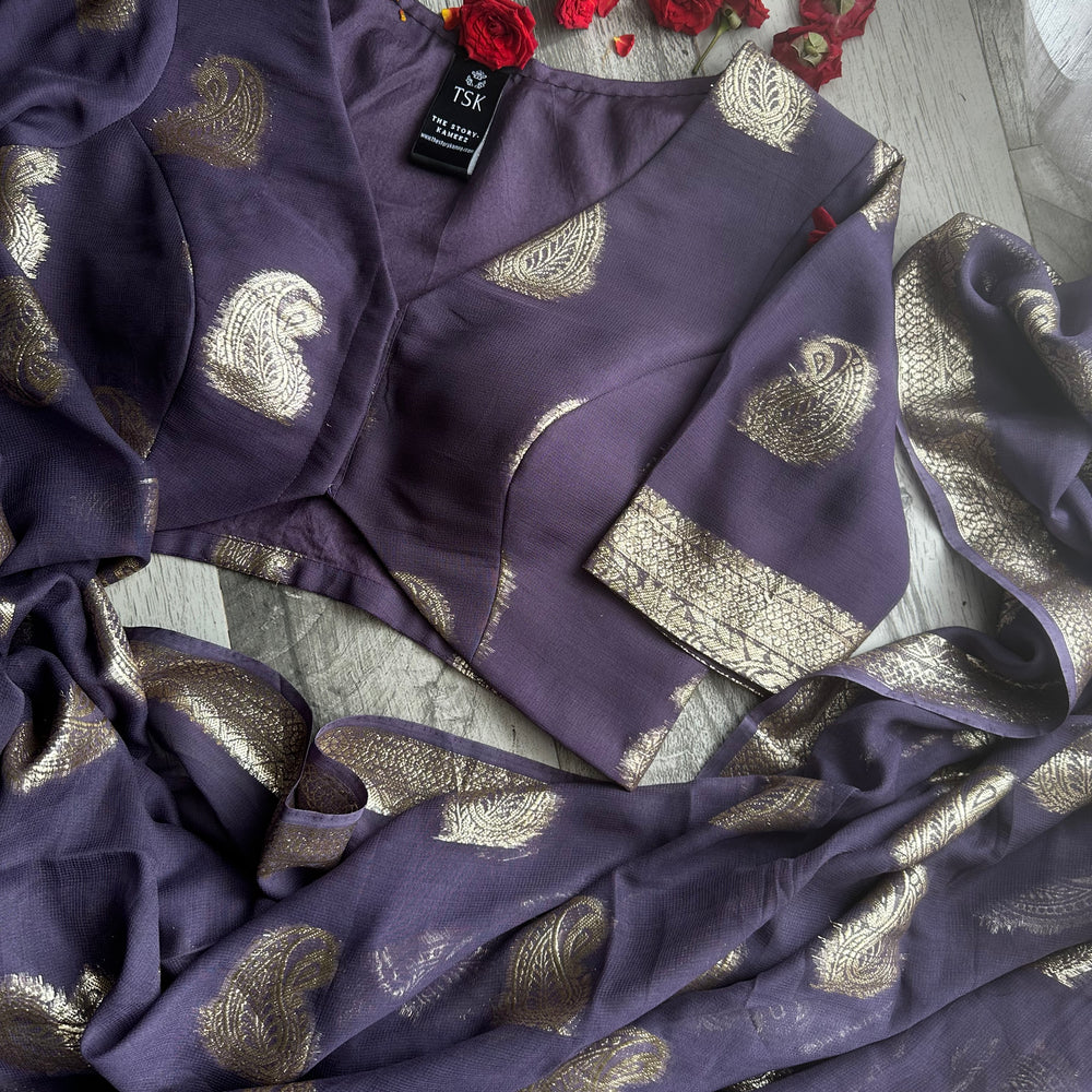 
                      
                        Rutvi’24 - Lilac Paisley Banarasi Soft Chiffon Saree
                      
                    