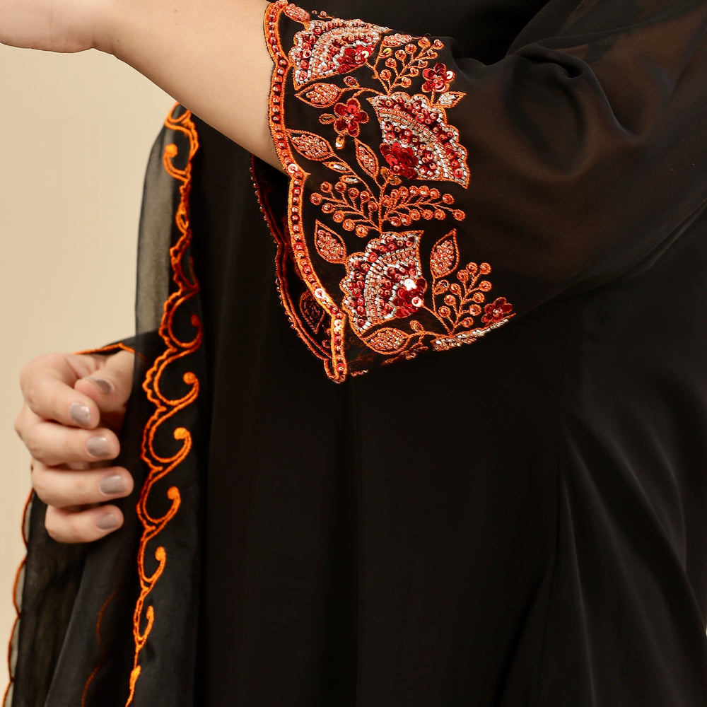 
                      
                        Black Premium embellished Burnt Orange kurta set
                      
                    