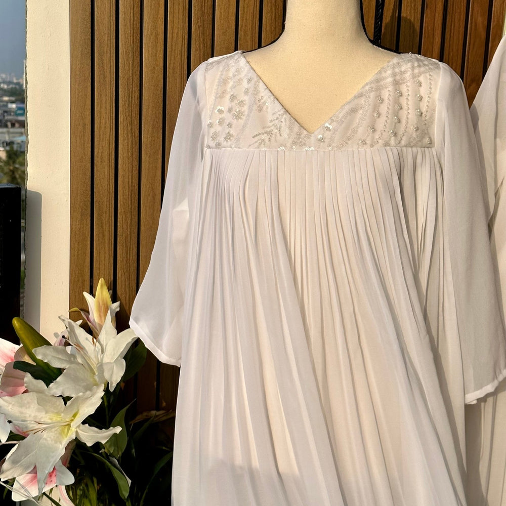 
                      
                        Angelic White kurta - The Story Kameez
                      
                    