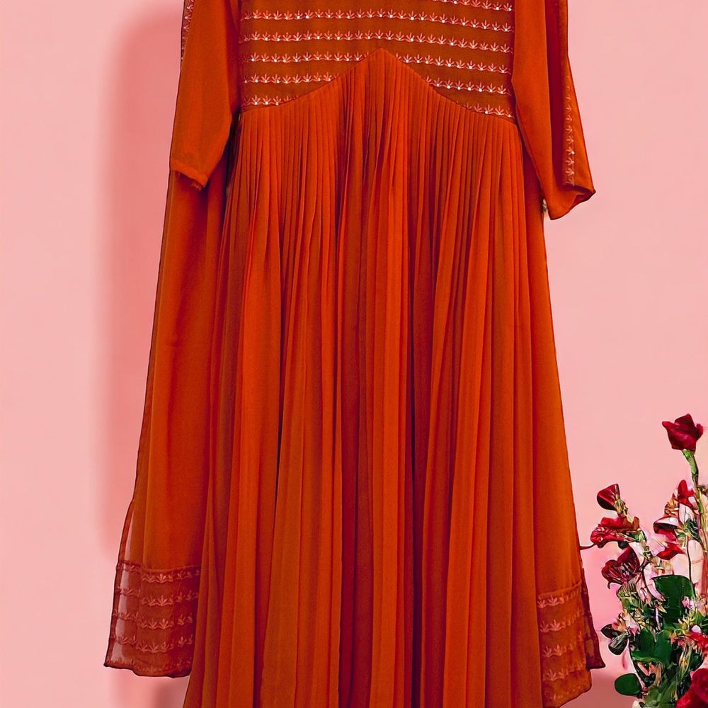 
                      
                        Burnt orange Kurta set - The Story Kameez
                      
                    