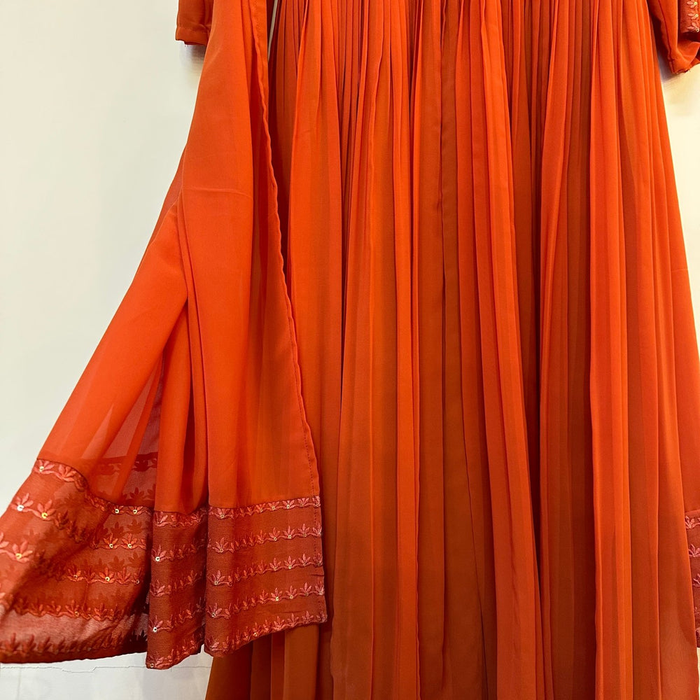 
                      
                        Burnt orange Kurta set - The Story Kameez
                      
                    