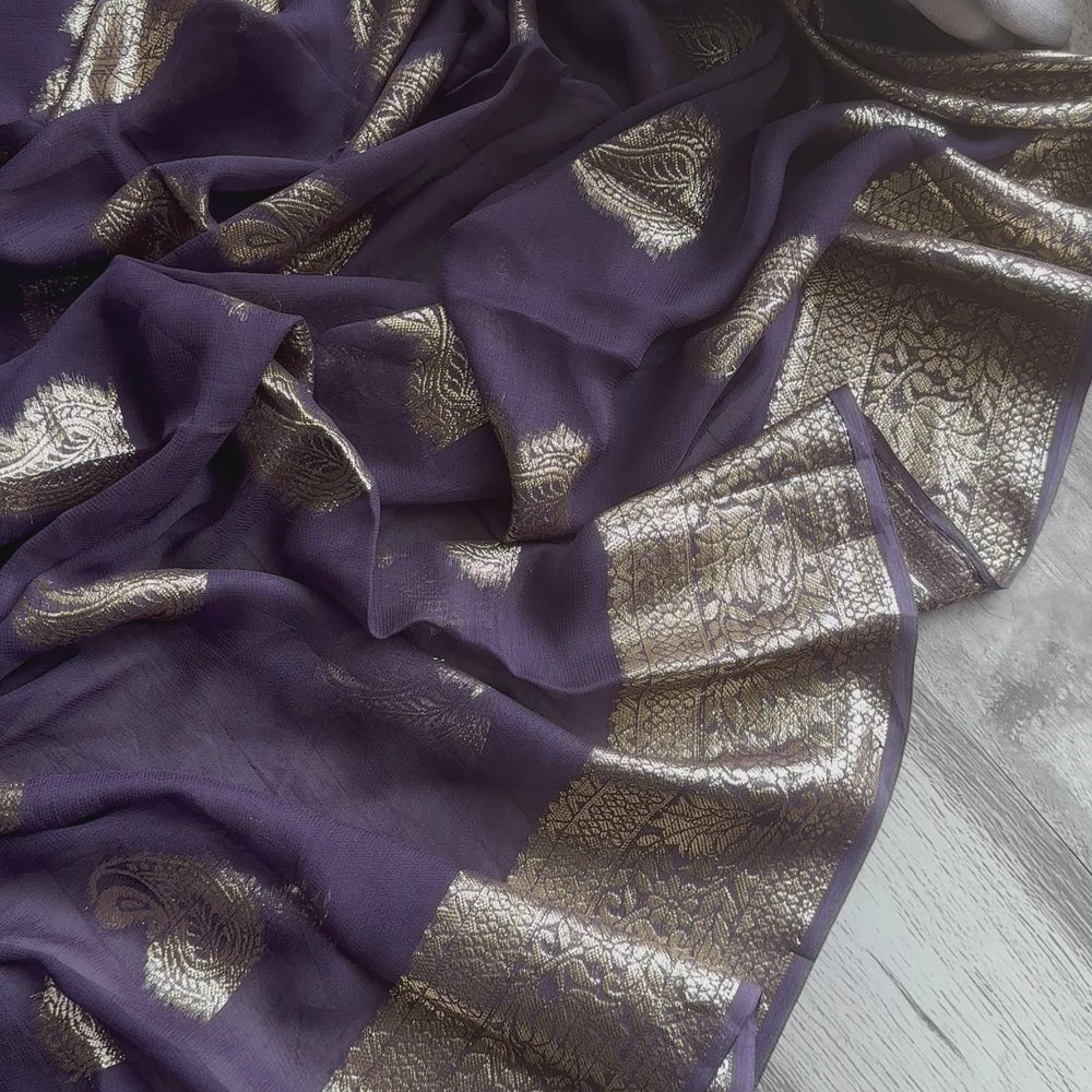 
                      
                        Load and play video in Gallery viewer, Rutvi’24 - Lilac Paisley Banarasi Soft Chiffon Saree
                      
                    